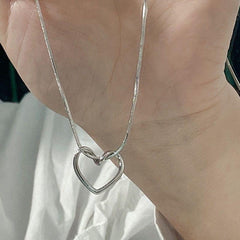 Twisted Heart Pendant Necklace Silver