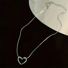 Twisted Heart Pendant Necklace Silver