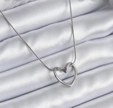 Twisted Heart Pendant Necklace Silver