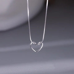 Twisted Heart Pendant Necklace Silver